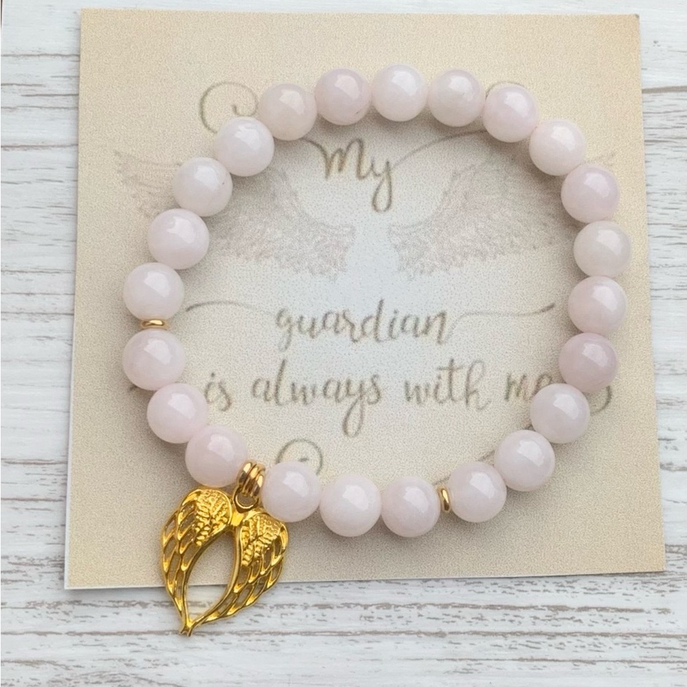 Angel wings beaded charm bracelet